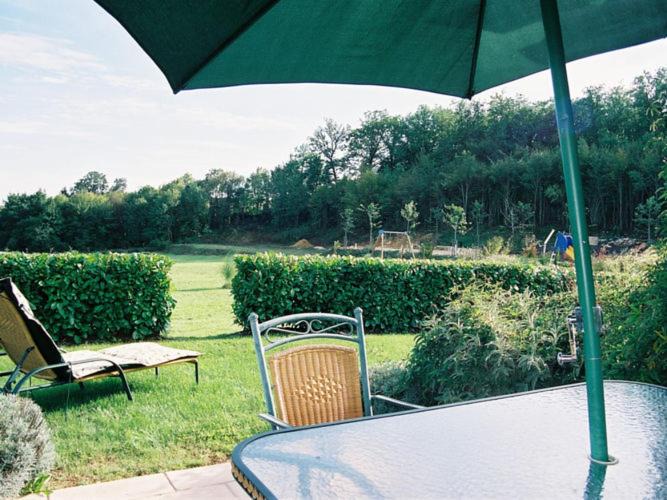 Castelnaud-la-Chapelle House | Attached house with garden for 2 people and a baby in a small scale park