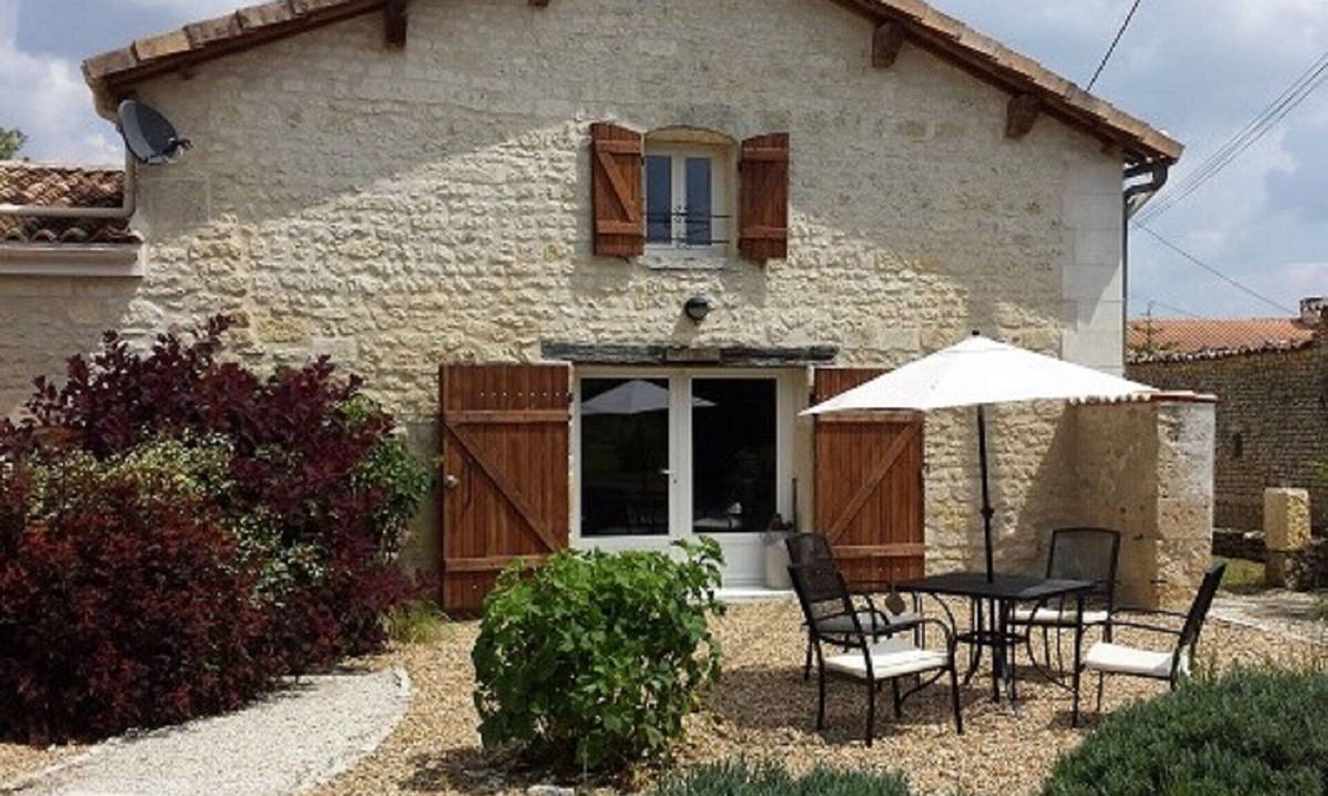 Bribaudon House | Stylish Family Friendly Gite, Village Location, with Shared Pool & Games Barn