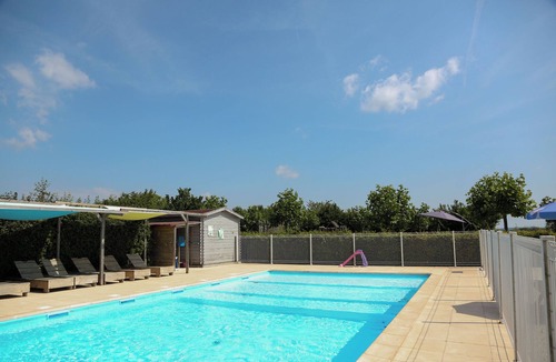 Jayac RV Rental | Glamping 'Safarilodge Prestige Tent 14 4 Pers' with Shared Pool, Private Terrace and Wi-Fi