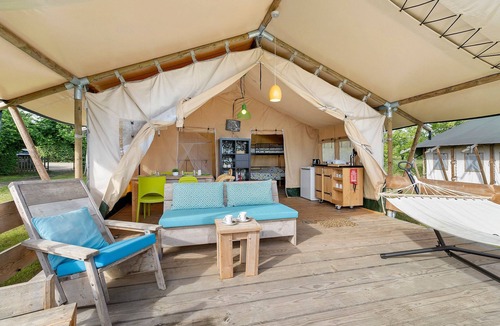 Jayac RV Rental | Glamping 'Safarilodge Tent 1 – 5 People' with Private Terrace, Shared Garden & Wi-Fi