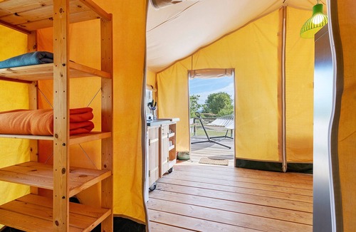 Jayac RV Rental | Glamping 'Safarilodge Tent 1 – 5 People' with Private Terrace, Shared Garden & Wi-Fi