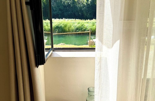 Vions House | Les Granges du Canal Beachfront home with direct access to the water