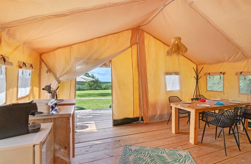 Jayac RV Rental | Safarilodgetent Prestige with Airco, Shared Pool, Private Terrace and Wi-Fi