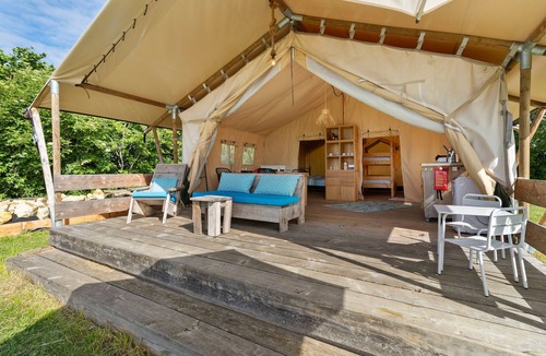 Jayac RV Rental | Safarilodgetent Prestige with Airco, Shared Pool, Private Terrace and Wi-Fi