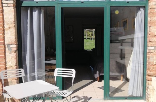 Fye Apartment | Studio "Du Meslay - Fyé" with Private Terrace, Shared Garden and Wi-Fi