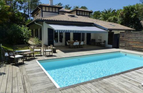 Soorts-Hossegor Villa | Villa des Acacias avec piscine chauffée pour 15 personnes entre lac et océan Wifi gratuit