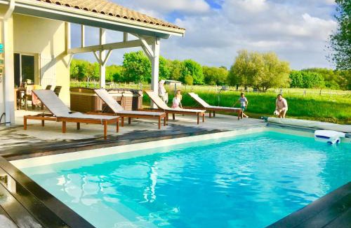 Sainte-Eulalie-en-Born Villa | Villa Landaise piscine chauffée&jacuzzi Plage Clim Fibre