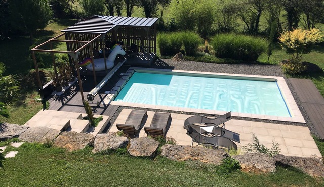 Architect house with terraces and outdoor swimming pool near medieval village