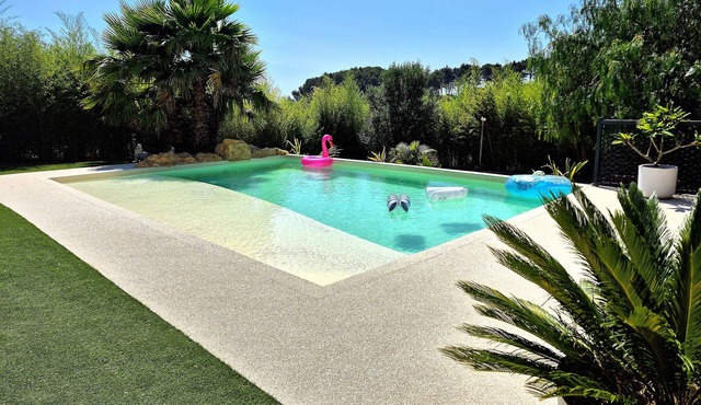 Contemporary villa with beach pool and exotic garden