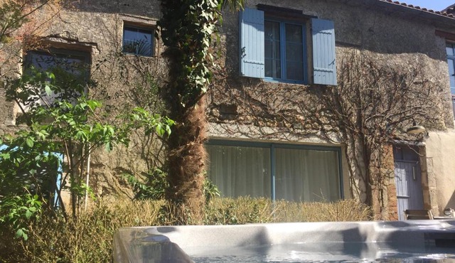 La Maison aux Volets Bleus
