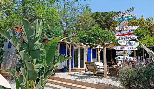 Lou Miou's Bohemian Cabin Right on the Water